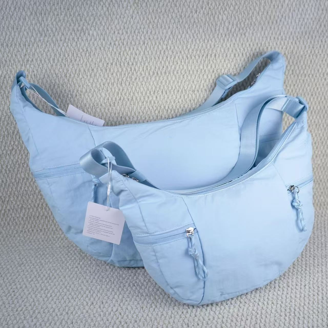 T588-894  Women's diagonal cross bag with cow horns, single shoulder crescent bag